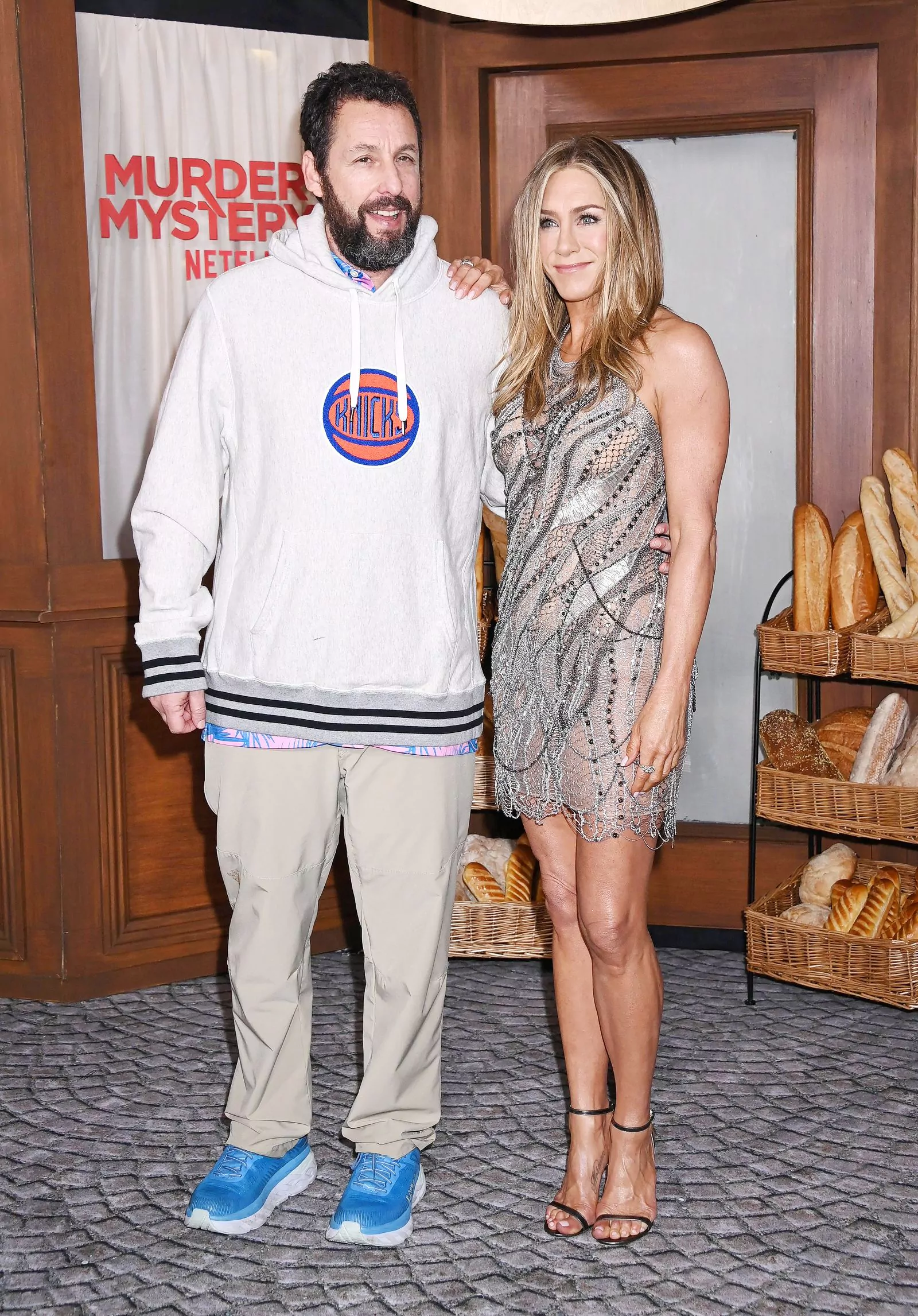 Adam Sandler and Jennifer Aniston at the premiere of Murder in Paris in Westwood, March 28, 2023.