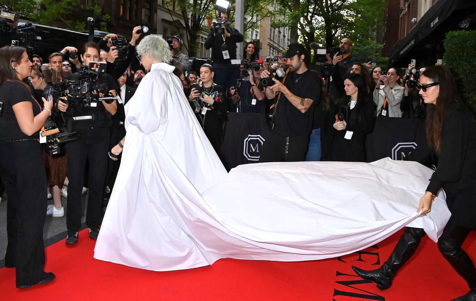 Cara Delevingne in Karl Lagerfeld at the 2023 Met Gala, May 1, 2023. Cara Delevingne in Karl Lagerfeld leaves The Mark Hotel before attending the Costume Institute Ball, May 1, 2023.