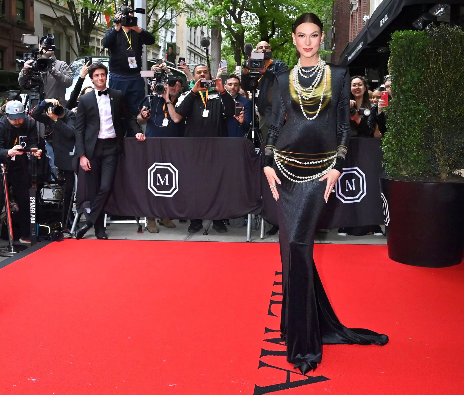 Karlie Kloss in Chanel at the 2023 Met Gala in New York City on May 1, 2023. Karlie Kloss in Chanel leaves The Mark Hotel before attending the Costume Institute Ball, May 1, 2023.